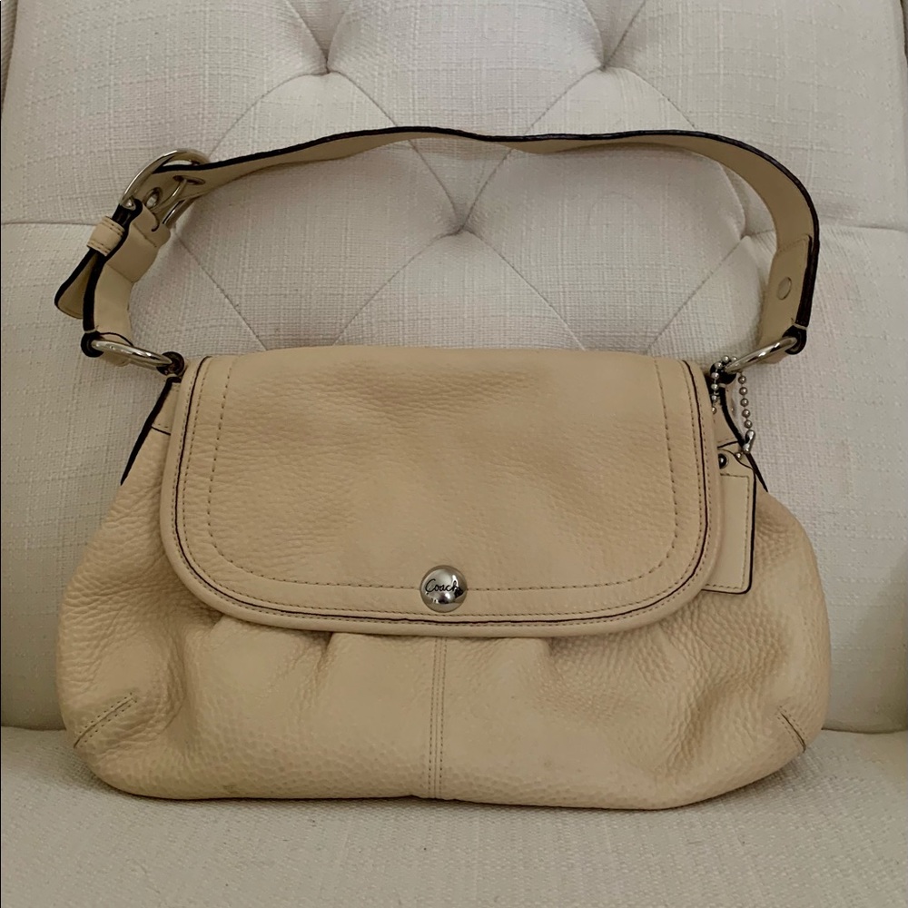 Ivory cream leather Coach hobo style shoulder bag with pink lining, barely used.